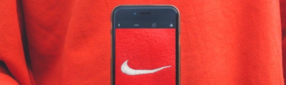 phone showing an image of nike jumper